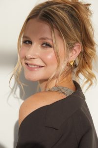 Mollie Pearce head and shoulders with hair in a bun