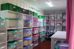 A warehouse full of tubs of stoma supplies