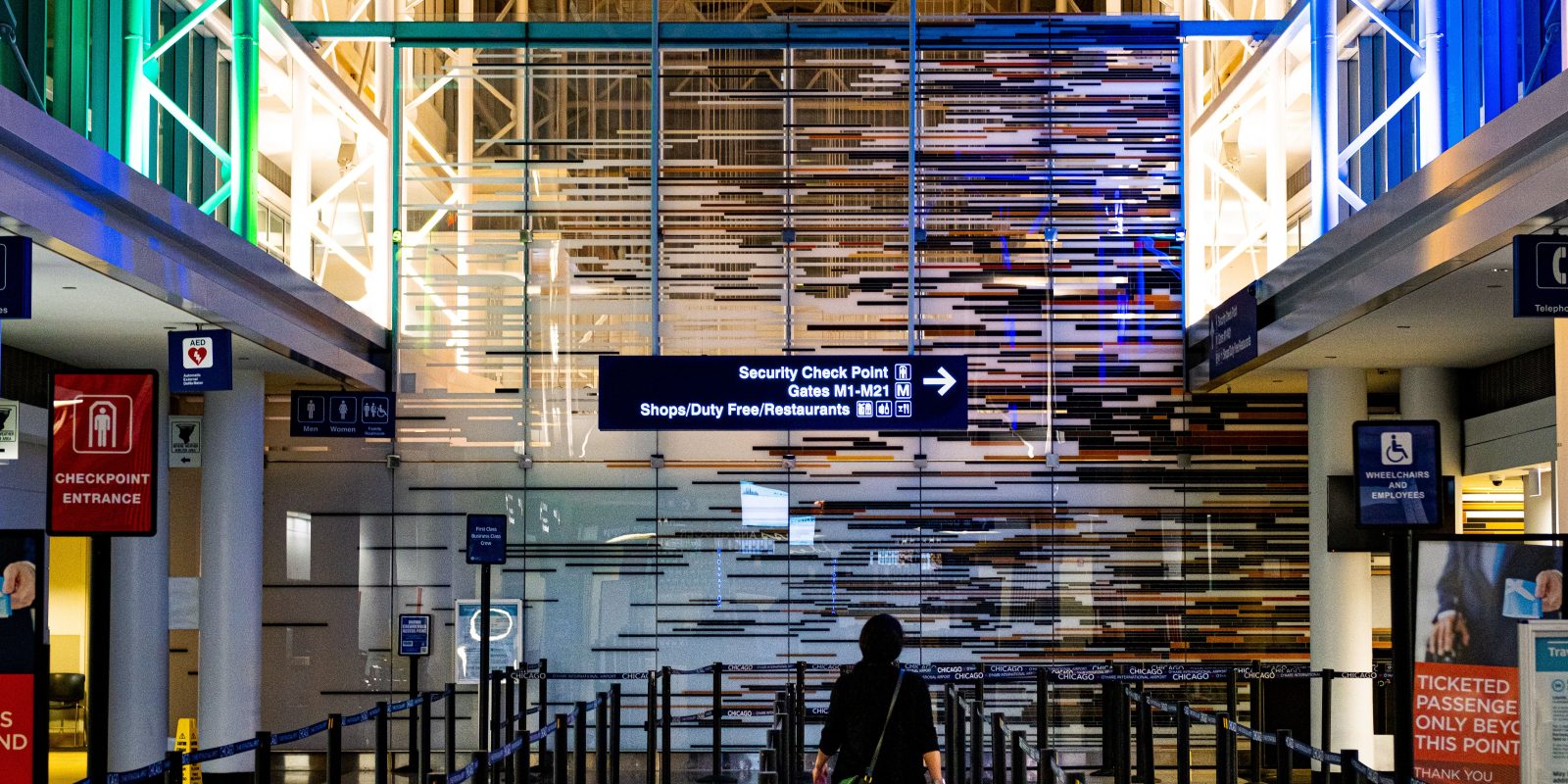 A traveler enters the security checkpoint at O'Hare Airport terminal, Chicago.